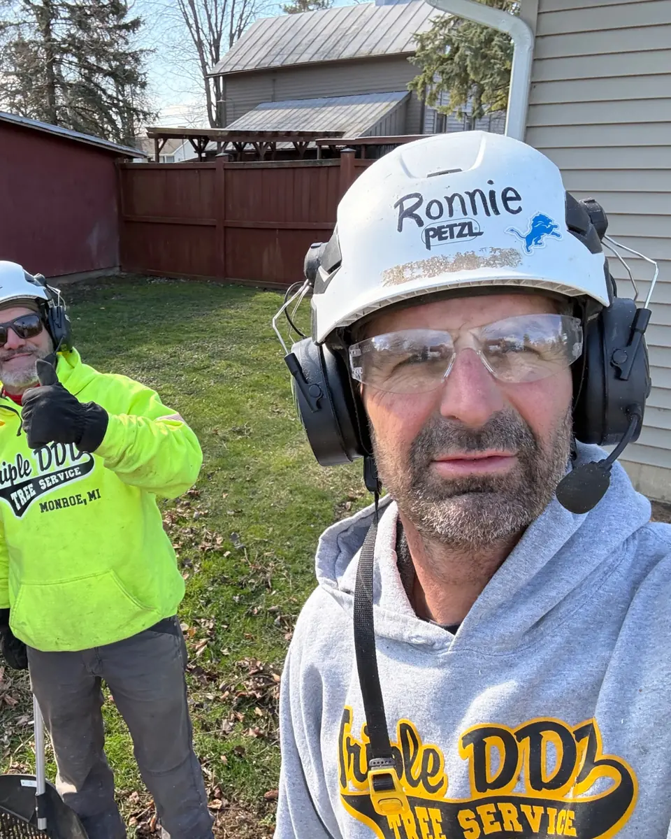 The Triple DDD crew in hard hats on a job