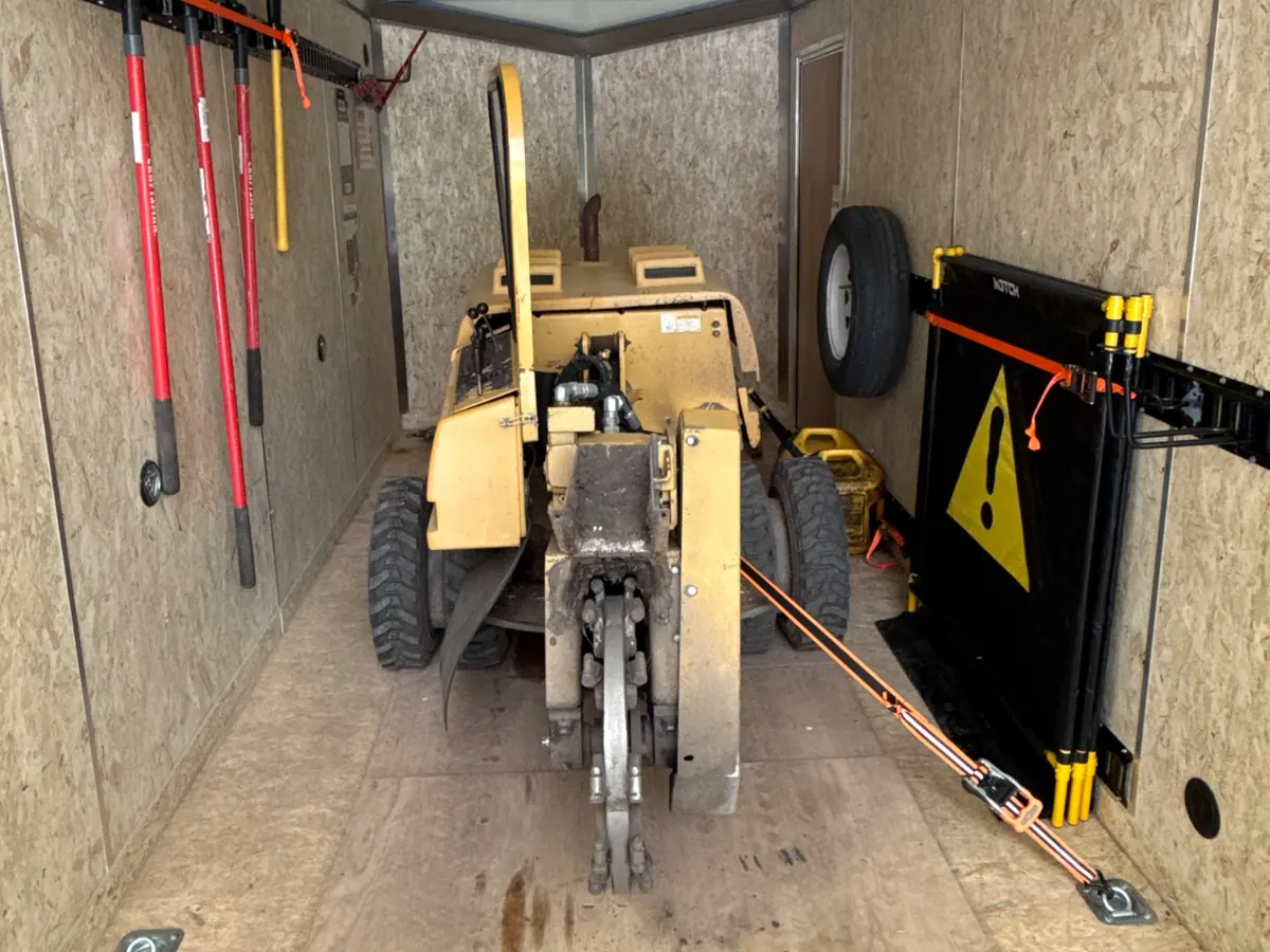 Triple DDD's stump grinder loaded in its trailer